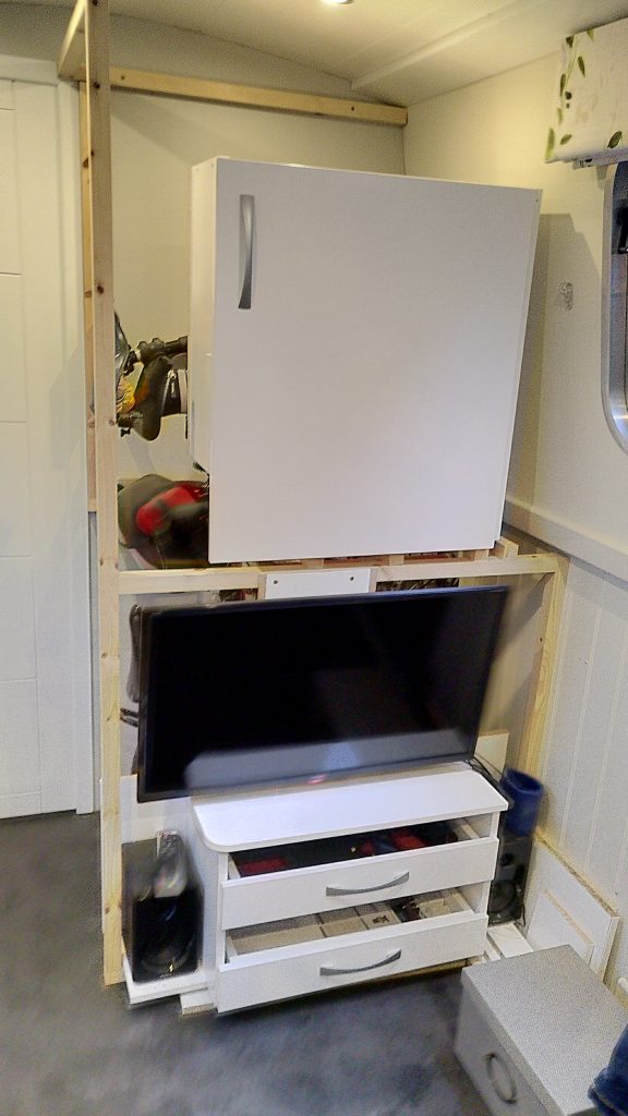 Cupboard Above TV and Drawers