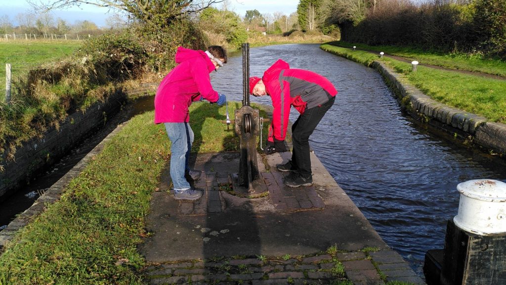 Clare and Bryn opening a lock paddle together