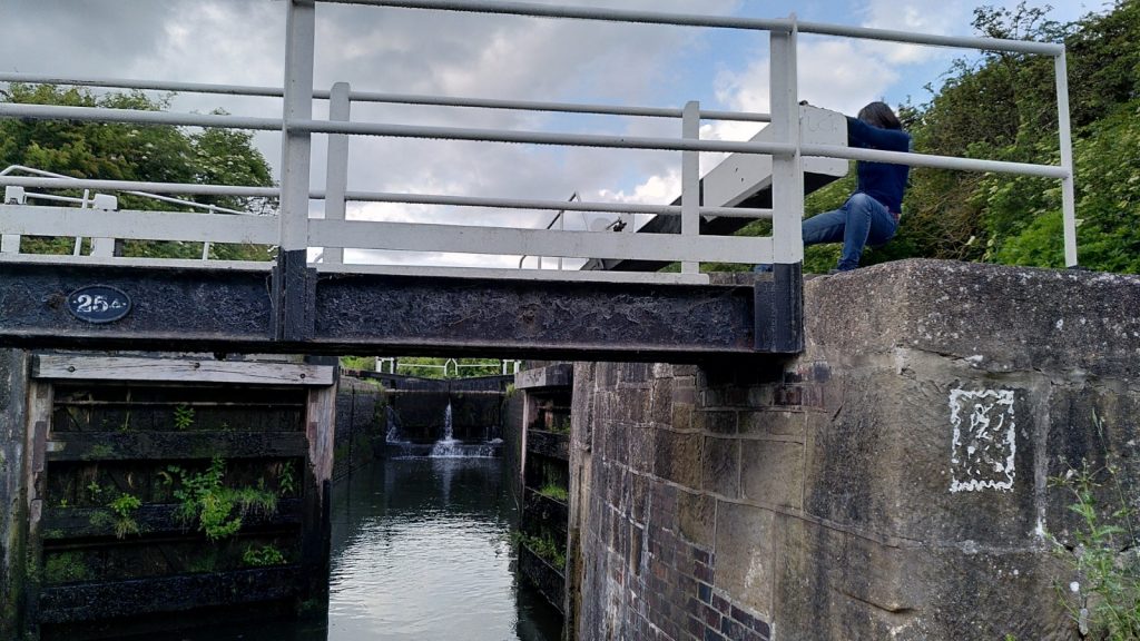 Clare Closing an Erewash Canal Lock Gate
