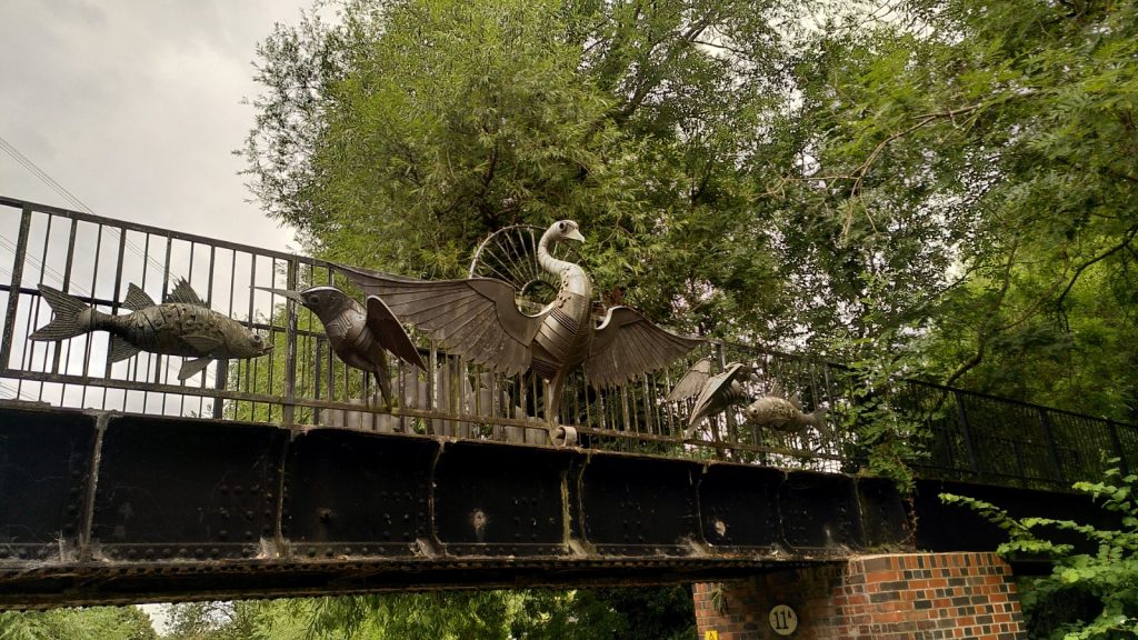 Metal Animal Artwork on Footbridge