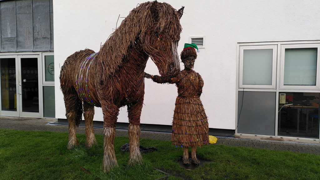 Woman leading Horse. Scuplture in straw at the Falkirk Wheel
