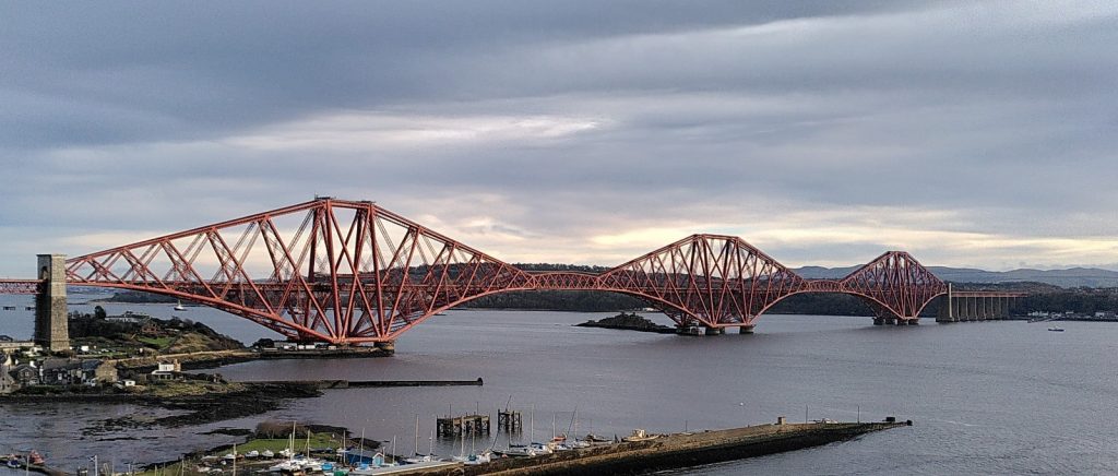 Three iconic spans of the Forth Bridge viewed from the north side of the Forth Road Bridge.